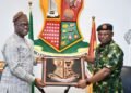 Oyo State Governor, Seyi Makinde (left) presenting a souvenir to Air Vice Marshal Kolade Ademuwagun, during a courtesy visit to Governor's Office, Secretariat, Ibadan, Monday, October 14, 2024.